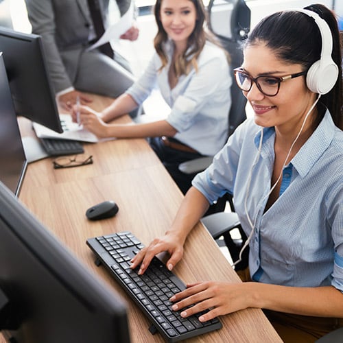 Two female tech support workers at one of the call centers in Costa Rica